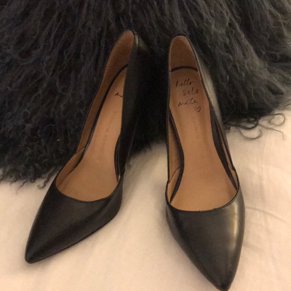 Never worn, new black pumps